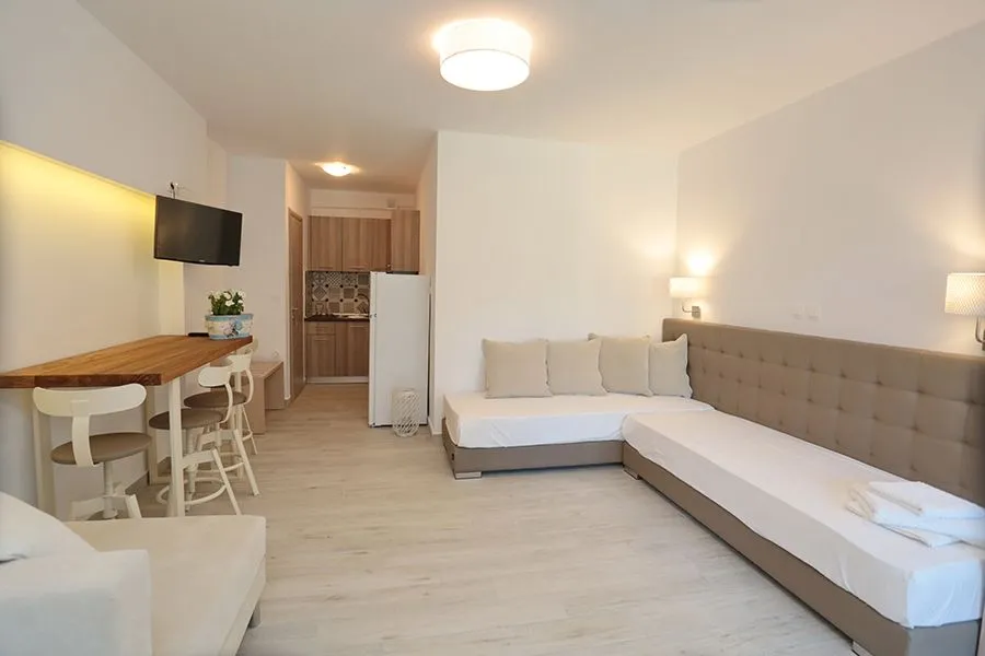 Tiara Holidays - Dionisos Resort - Luxury Apartment Ground Floor - living room